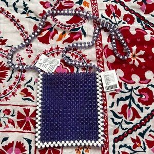 NWT Urban outfitters super cute purple and white beaded little crossbody bag!🔮